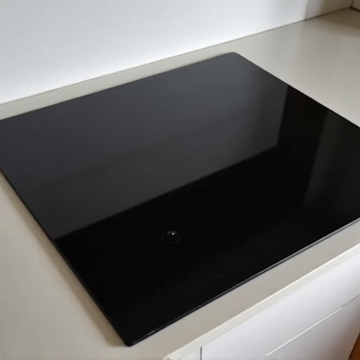 After image of the electric cooktop in Elk Grove with its surface meticulously restored, looking smooth and scratch-free.